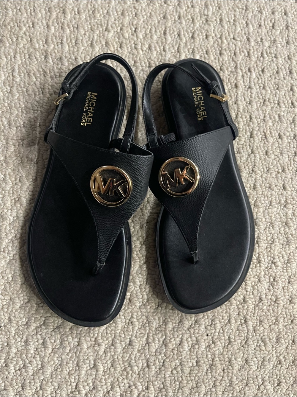 MICHAEL Michael Kors Black Sandal with Gold MK Medallion